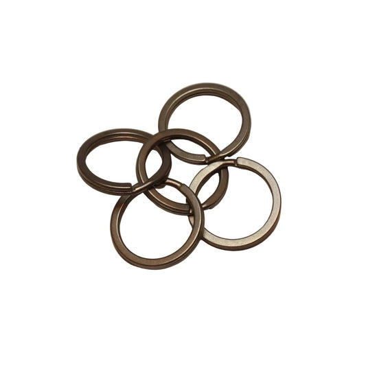 EDC Titanium Split Rings - Pack of 5 - Averx GearSet of metal rings on a beige backgroundAVERX Gear